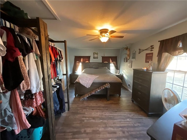 52720 S 680, Colcord, OK 74338 - bedroom featuring wood finished floors, baseboards, and a ceiling fan