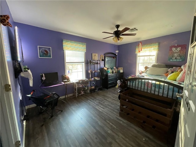 52720 S 680, Colcord, OK 74338 - bedroom with wood finished floors, a desk, a ceiling fan, and baseboards