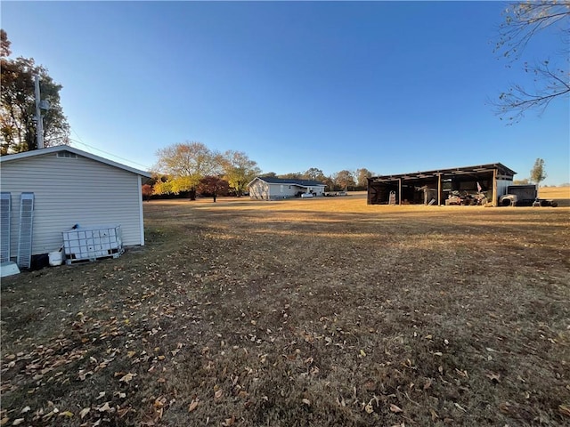 52720 S 680, Colcord, OK 74338 - view of yard with an outbuilding and a carport