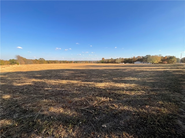 exterior space with a rural view