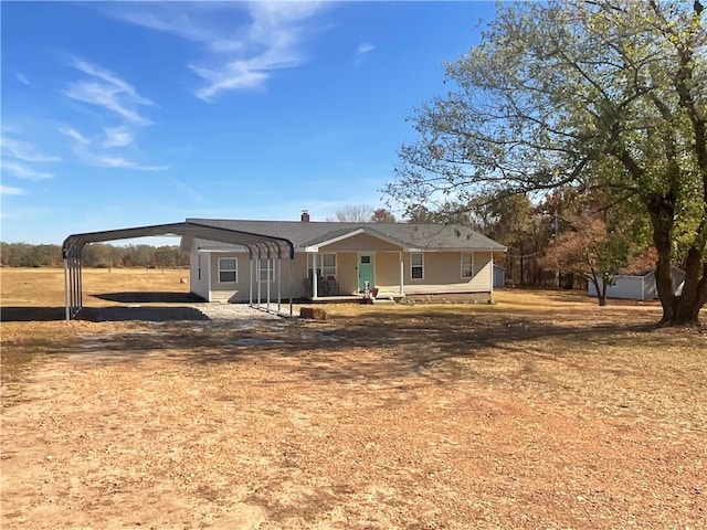 52720 S 680, Colcord, OK 74338 - view of front of home featuring a detached carport and dirt driveway