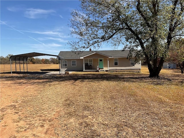 52720 S 680, Colcord, OK 74338 - ranch-style home featuring a detached carport, covered porch, and driveway