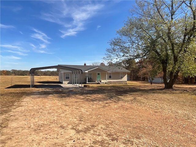 exterior space with a carport