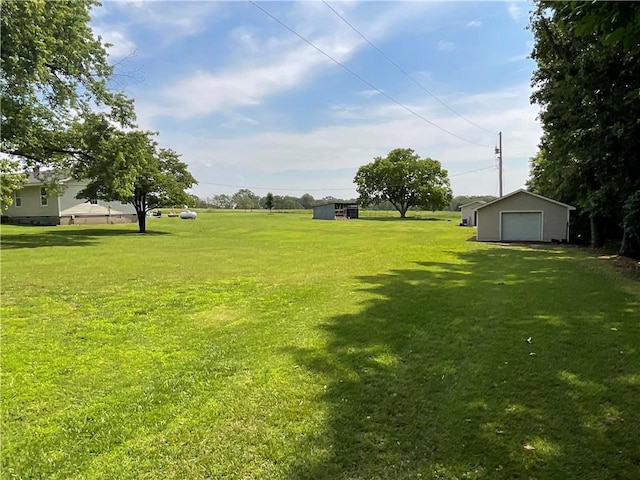 52720 S 680, Colcord, OK 74338 - view of grassy yard with an outbuilding and a detached garage