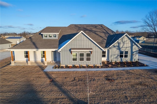 modern farmhouse style home with covered porch