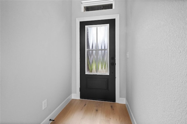 entryway with light wood-type flooring