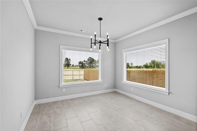 unfurnished room featuring a notable chandelier, ornamental molding, and a wealth of natural light