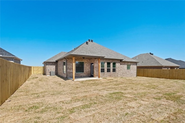 back of property featuring a patio area