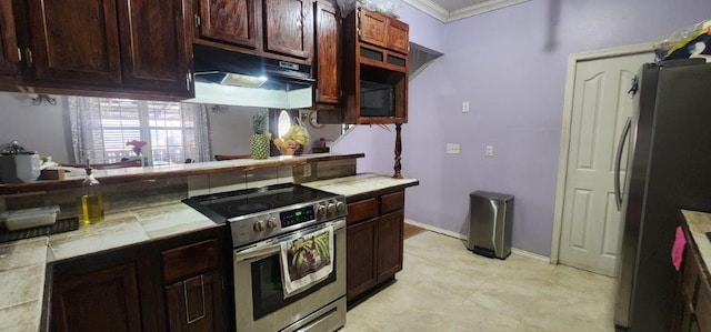 kitchen featuring crown molding and stainless steel appliances