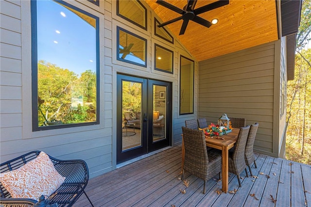 wooden terrace featuring french doors and ceiling fan