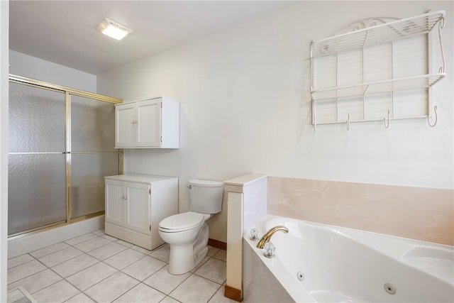 bathroom featuring tile patterned floors, toilet, and shower with separate bathtub