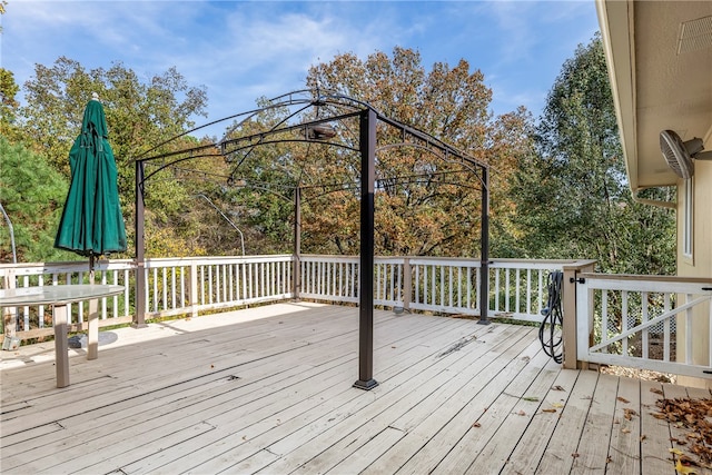 wooden deck with a gazebo