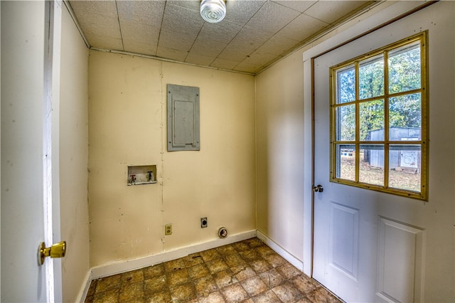 laundry room with hookup for an electric dryer, electric panel, and hookup for a washing machine