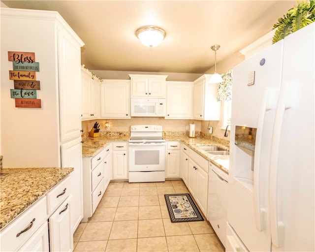 kitchen with sink, white cabinetry, decorative light fixtures, and white appliances