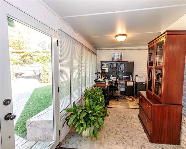 office space with wooden walls