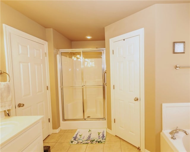 bathroom with vanity, separate shower and tub, and tile patterned flooring