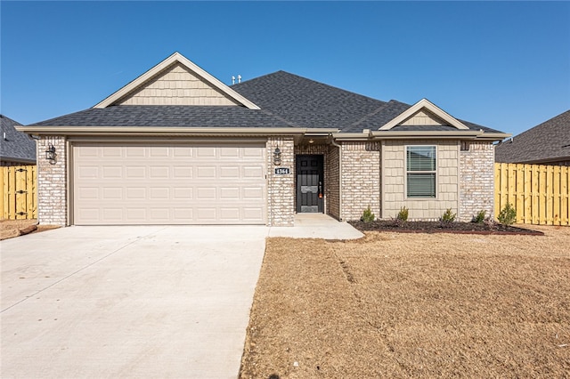 view of front of house with a front lawn and a garage