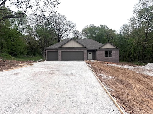 9306 Pleasant Valley Rd, Gentry, AR 72734 - single story home with brick siding, a garage, and driveway