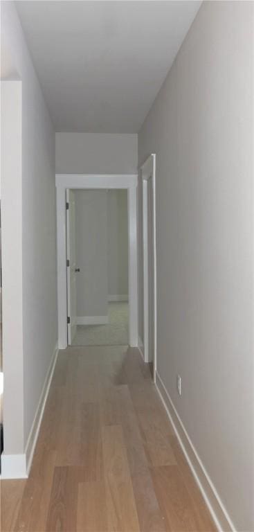 9306 Pleasant Valley Rd, Gentry, AR 72734 - hallway with light wood-type flooring and baseboards