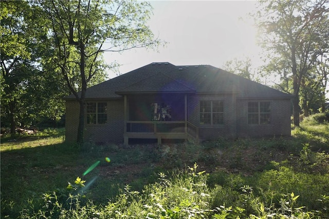 9306 Pleasant Valley Rd, Gentry, AR 72734 - rear view of house featuring brick siding and a shingled roof