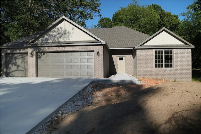 9306 Pleasant Valley Rd, Gentry, AR 72734 - single story home with brick siding, an attached garage, concrete driveway, and roof with shingles