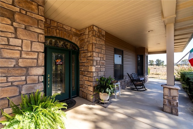 entrance to property with a porch