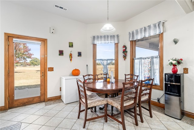 dining room featuring light tile patterned floors