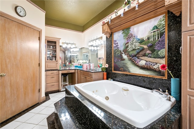 bathroom featuring vanity, tiled tub, and tile patterned floors