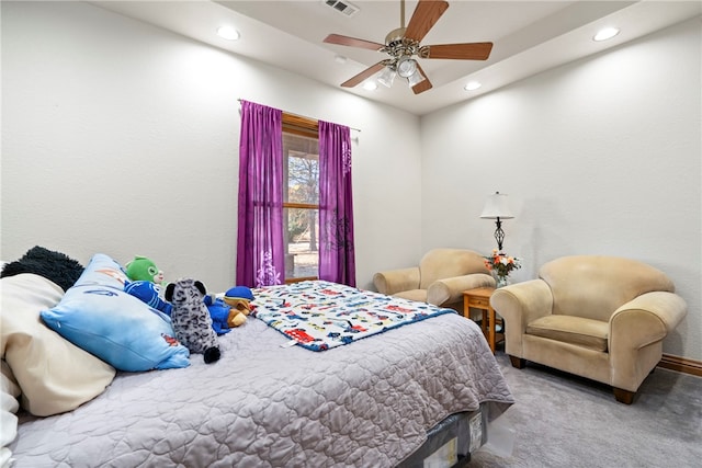 carpeted bedroom featuring ceiling fan