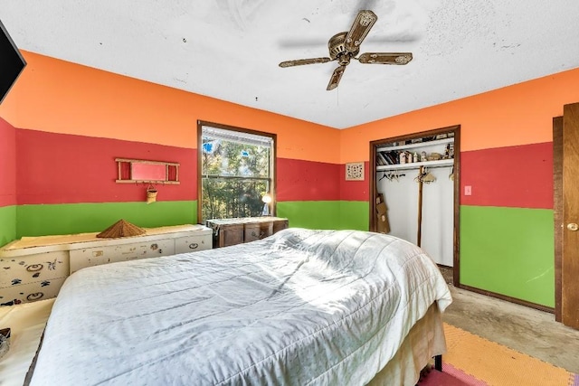 bedroom with a closet and ceiling fan