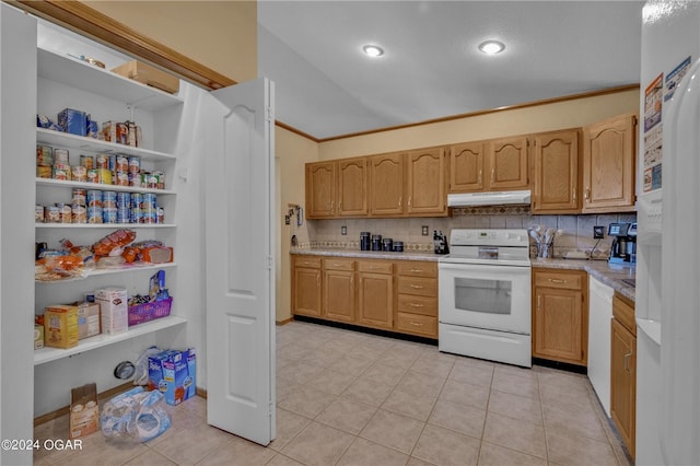 kitchen with crown molding, light tile patterned flooring, backsplash, and white appliances