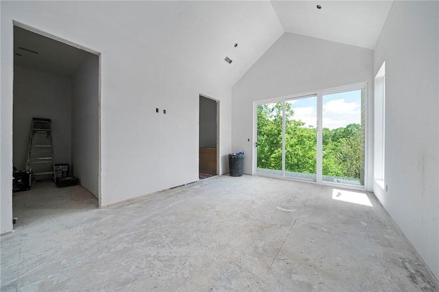 8912 Anew Rd, Rogers, AR 72756 - unfurnished living room with high vaulted ceiling