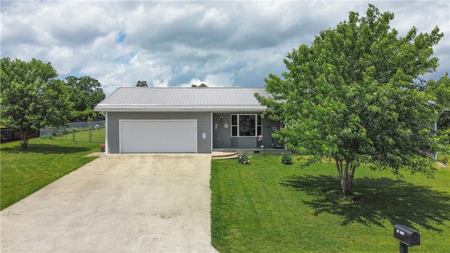 single story home featuring a front yard and a garage