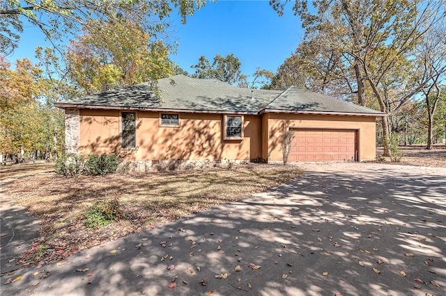 ranch-style house with a garage