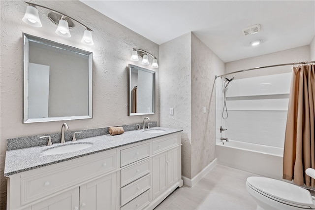 full bathroom with shower / bath combination with curtain, tile patterned floors, vanity, and toilet