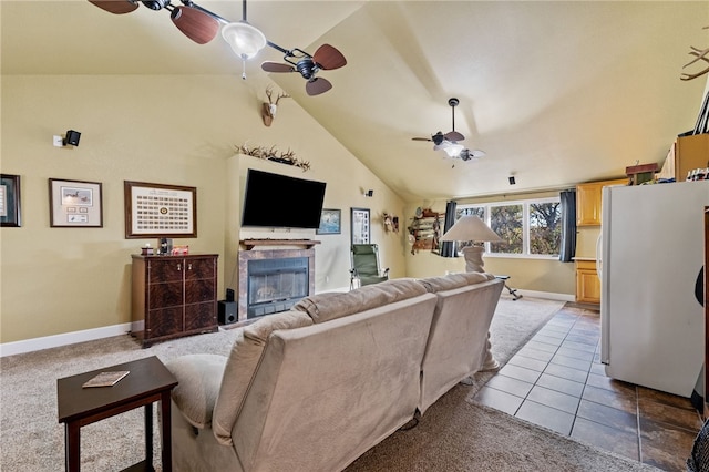 carpeted living room featuring lofted ceiling and ceiling fan