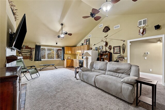 living room featuring high vaulted ceiling, light colored carpet, and ceiling fan