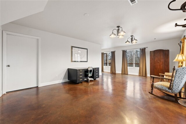 living area featuring a chandelier