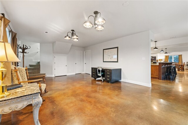 living room with a notable chandelier