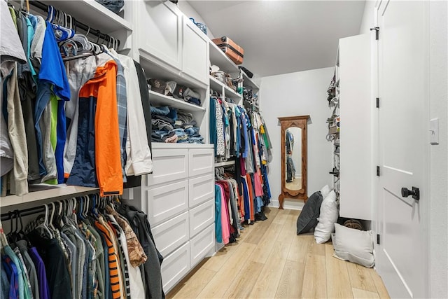 walk in closet featuring light wood-style floors