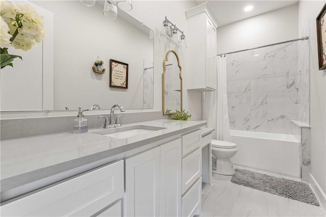 full bathroom featuring marble finish floor, shower / bath combo, vanity, and toilet