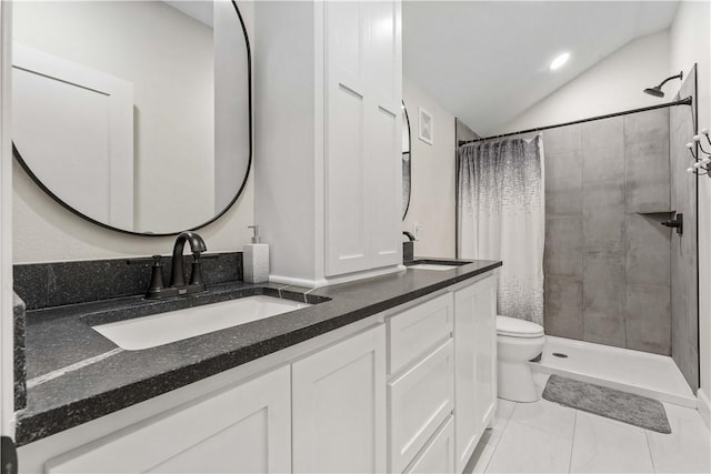 full bathroom with lofted ceiling, tiled shower, a sink, and double vanity