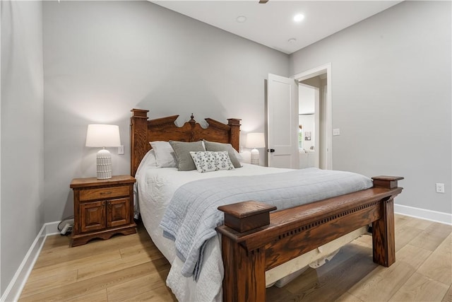 bedroom featuring baseboards, recessed lighting, and light wood-style floors