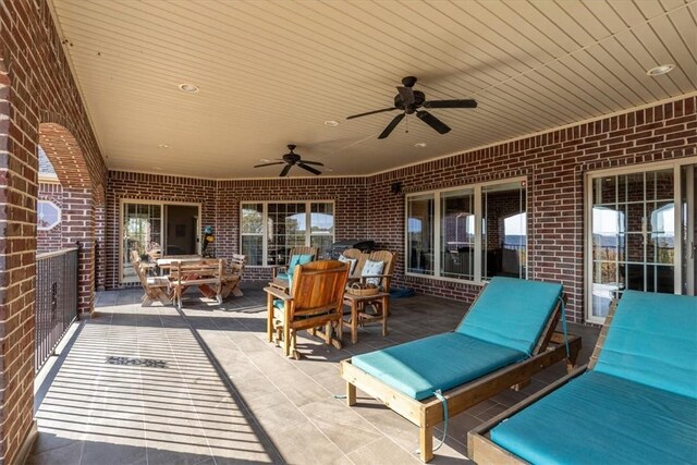 view of patio with ceiling fan