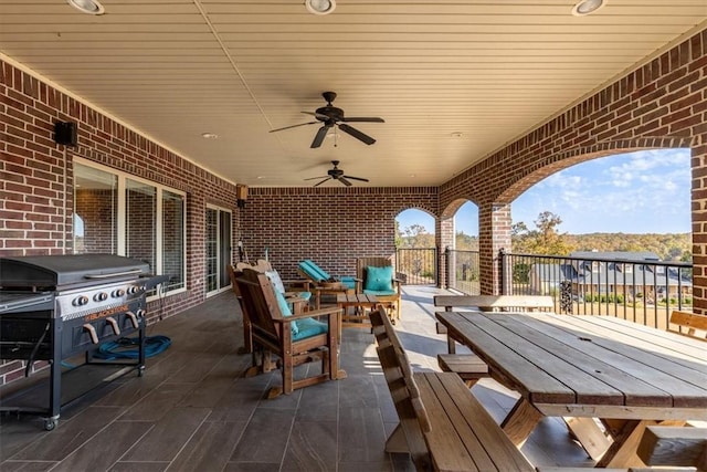14600 S Mountain, Lowell, AR 72745 - view of patio / terrace with grilling area and ceiling fan
