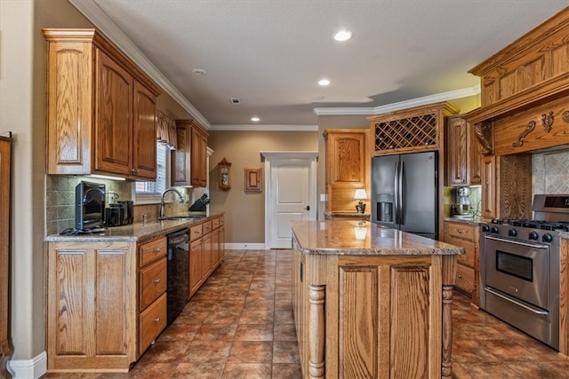 kitchen with stainless steel appliances, tasteful backsplash, and light stone countertops