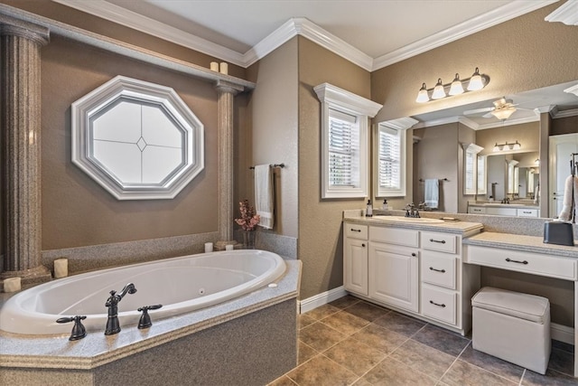 bathroom featuring ornamental molding, a bathing tub, vanity, and ceiling fan