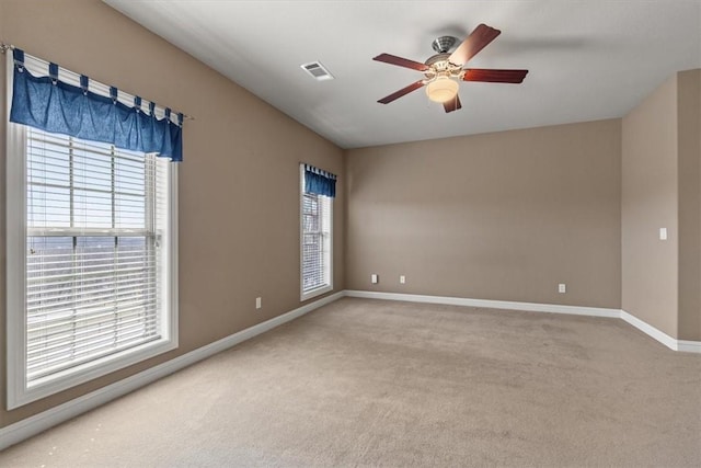 14600 S Mountain, Lowell, AR 72745 - spare room with light colored carpet, ceiling fan, and baseboards