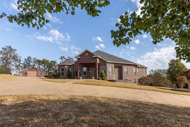 14600 S Mountain, Lowell, AR 72745 - view of front of home with brick siding and driveway