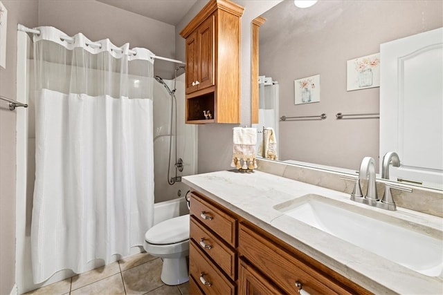 full bathroom featuring toilet, vanity, tile patterned floors, and shower / tub combo with curtain